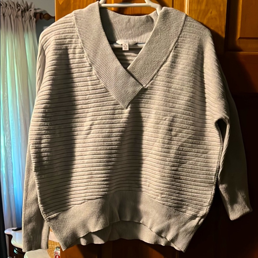 Grey, oversized fit sweater. Medium